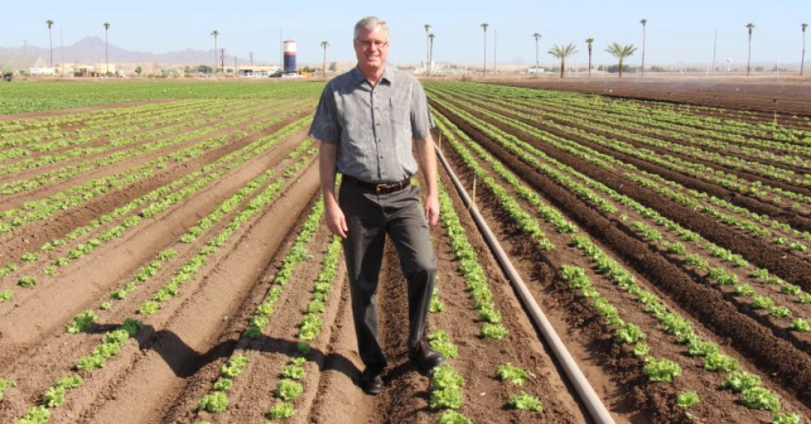 Paul Brierly in a Yuma ag field