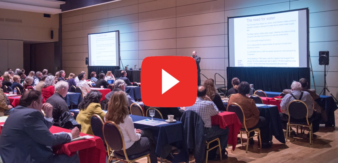 conference crowd with youtube icon overalyed