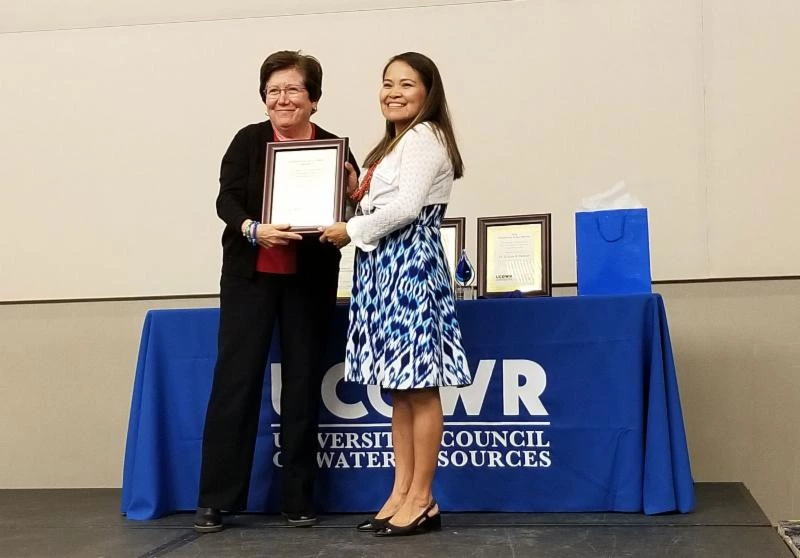  Karletta Chief presenting an award to Sharon B. Megdal