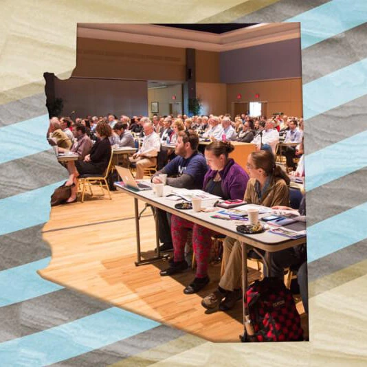 image of conference attendees in shape of Arizona state